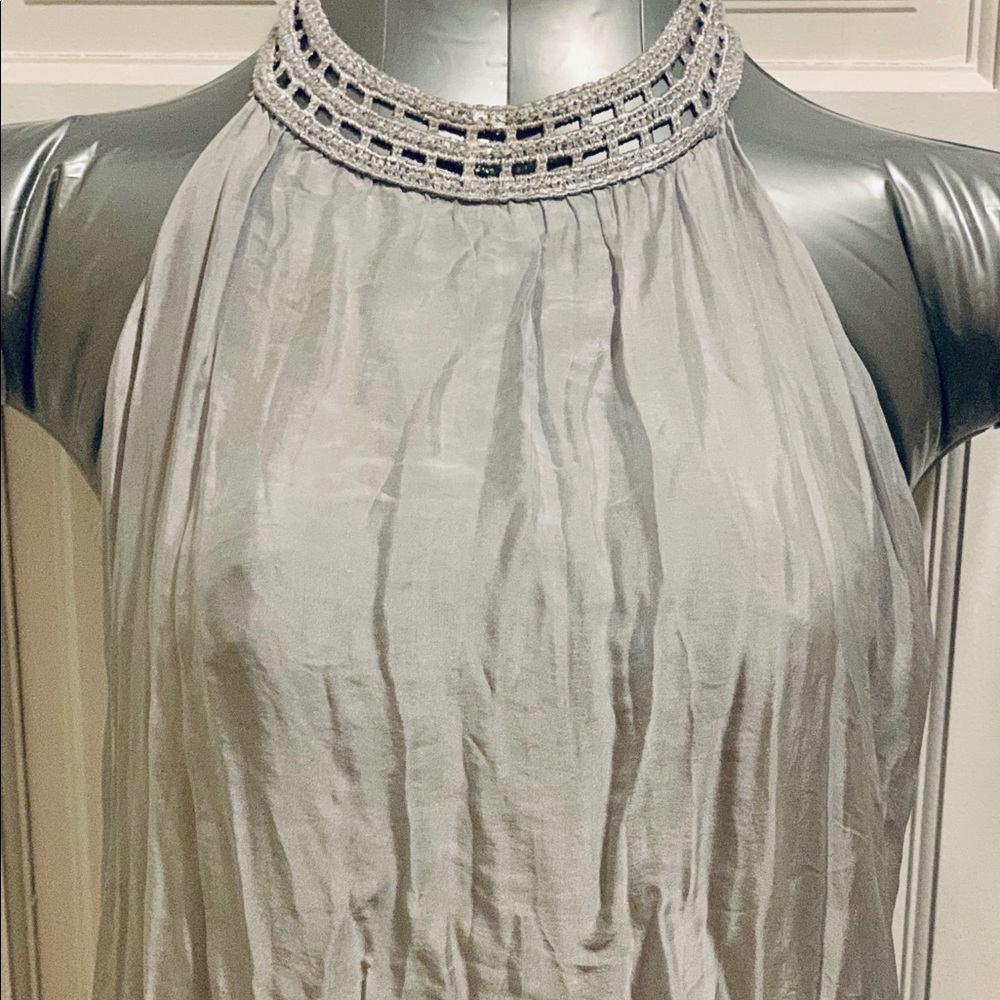 Stunning women’s knee-length silver satin dress